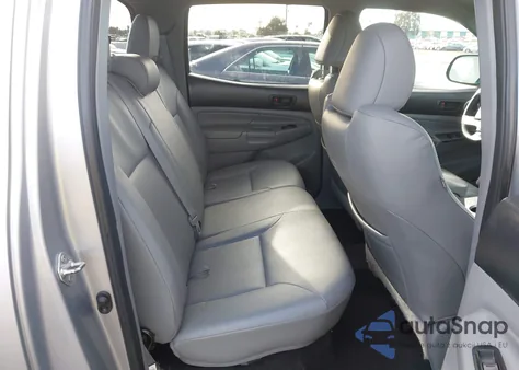 2014 Toyota Tacoma Base V6 z USA, uszkodzony, nr VIN 3TMLU4EN9EM143255